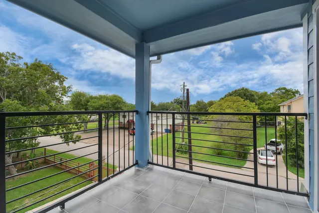 a view of a balcony with an outdoor space