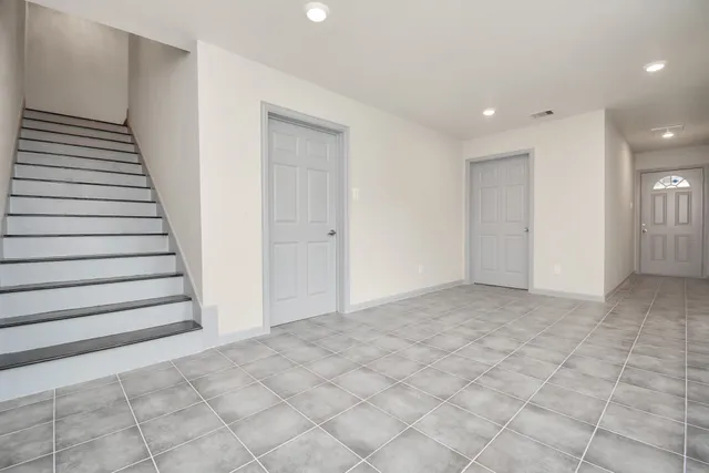 a view of an entryway with stairs