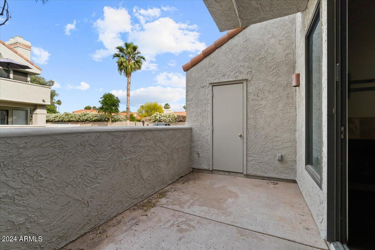 10115 East Mountain View Road, Unit 1102 Scottsdale, AZ 85258 - Photo 26 of 31 a view of a house with a street