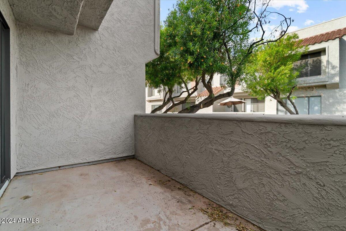 10115 East Mountain View Road, Unit 1102 Scottsdale, AZ 85258 - Photo 27 of 31 a view of a house with a tree