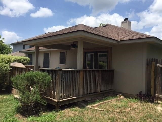 150 Madisons Way Buda, TX 78610 - Photo 11 of 11 a view of a house with a small yard and plants