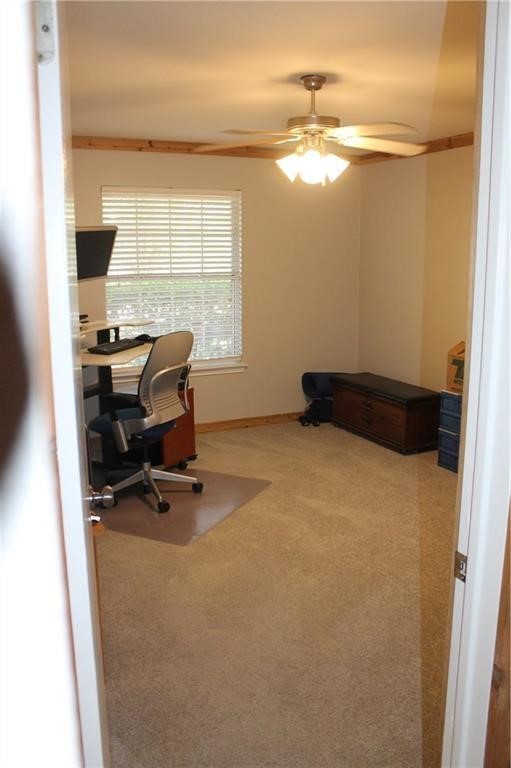 150 Madisons Way Buda, TX 78610 - Photo 6 of 11 a view of workspace with a window