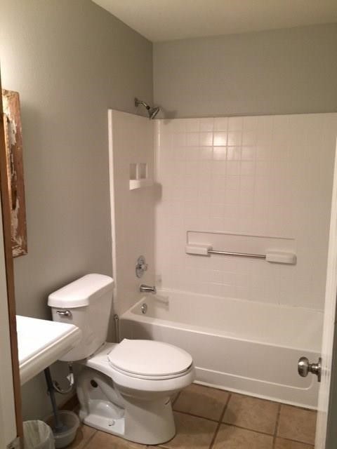 150 Madisons Way Buda, TX 78610 - Photo 8 of 11 a white toilet sitting next to a bath tub