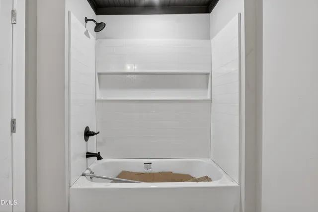a bathroom with a bathtub