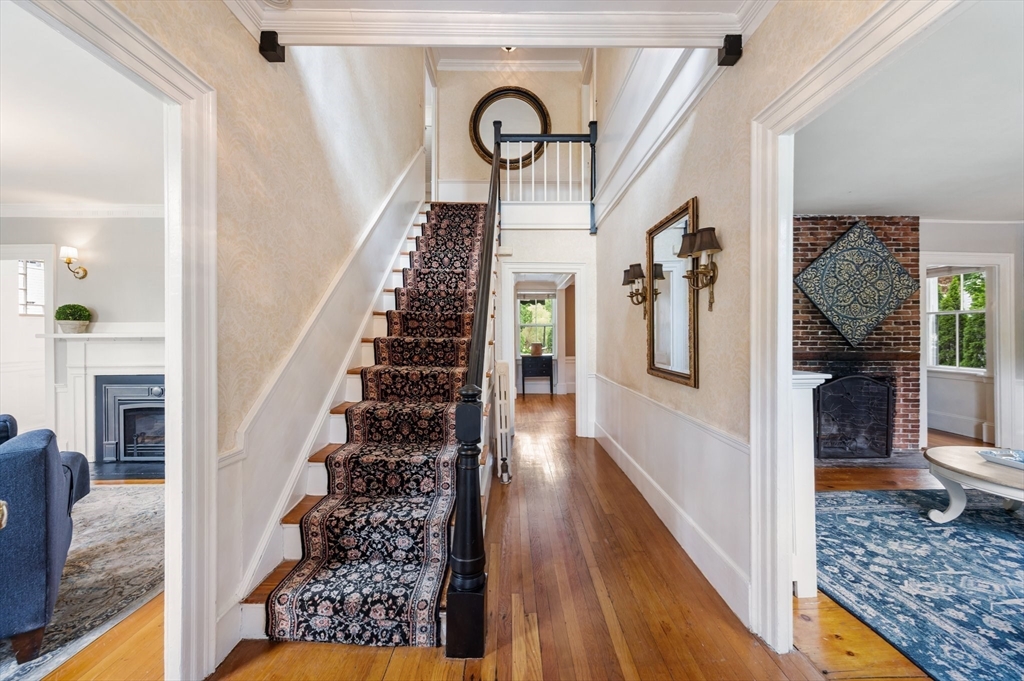 651 Main Street Hingham, MA 02043 - Photo 18 of 42 a view of entryway and hall with wooden floor