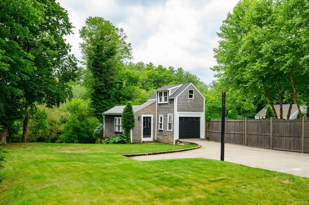651 Main Street Hingham, MA 02043 - Photo 39 of 42 a view of a house with a yard and porch