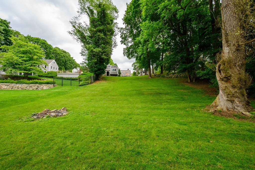 651 Main Street Hingham, MA 02043 - Photo 42 of 42 a front view of a house with garden