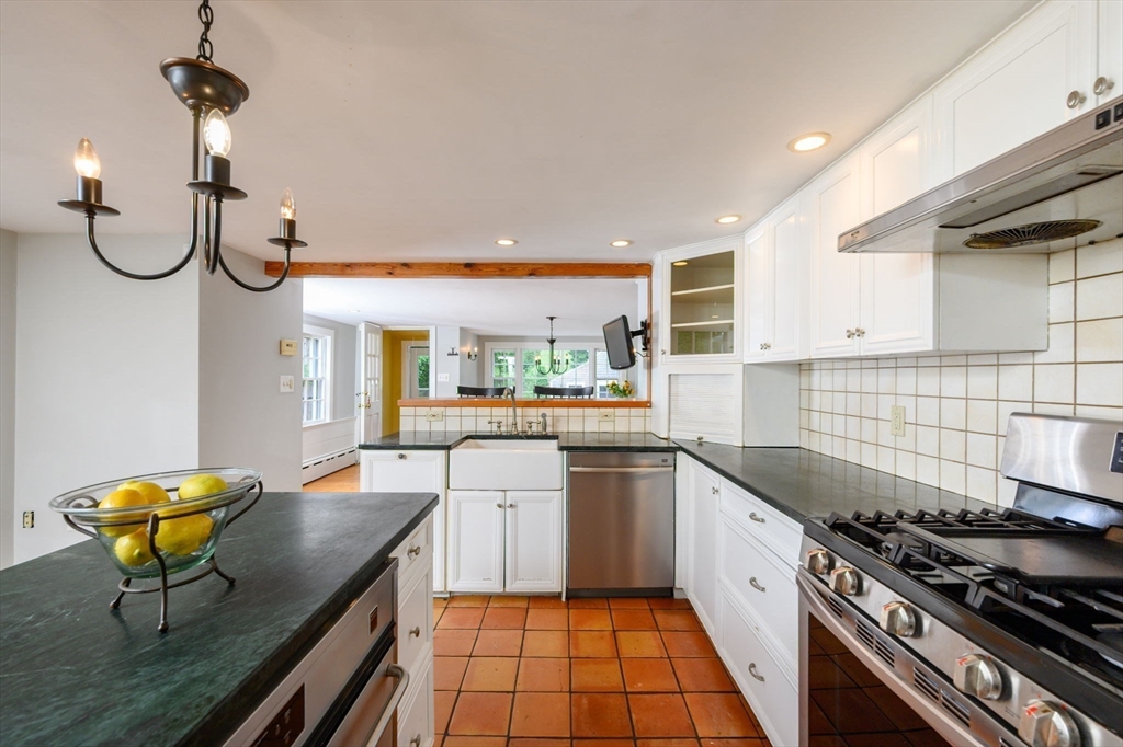 651 Main Street Hingham, MA 02043 - Photo 5 of 42 a kitchen with cabinets and appliances
