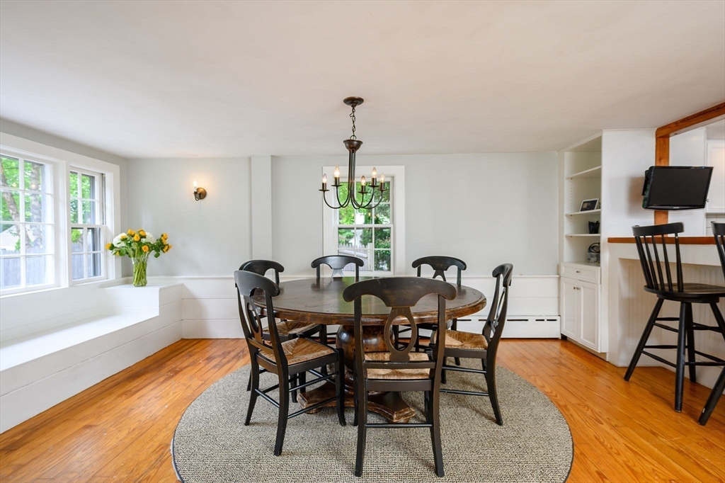651 Main Street Hingham, MA 02043 - Photo 8 of 42 a view of a dining room with furniture and window