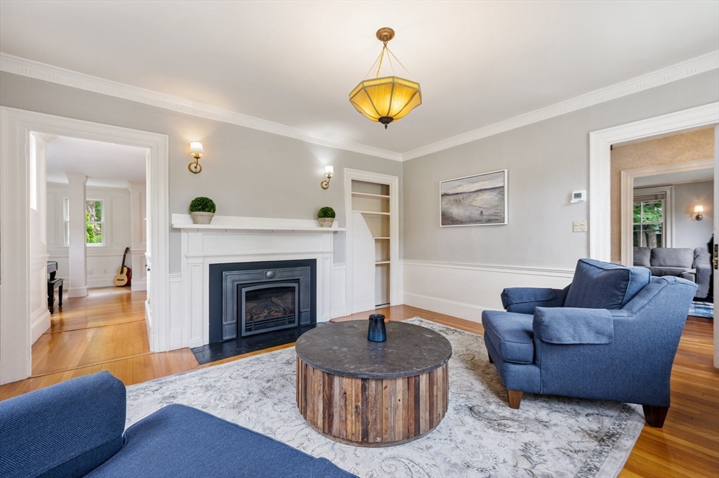 651 Main Street Hingham, MA 02043 - Photo 9 of 42 a living room with furniture and a fireplace