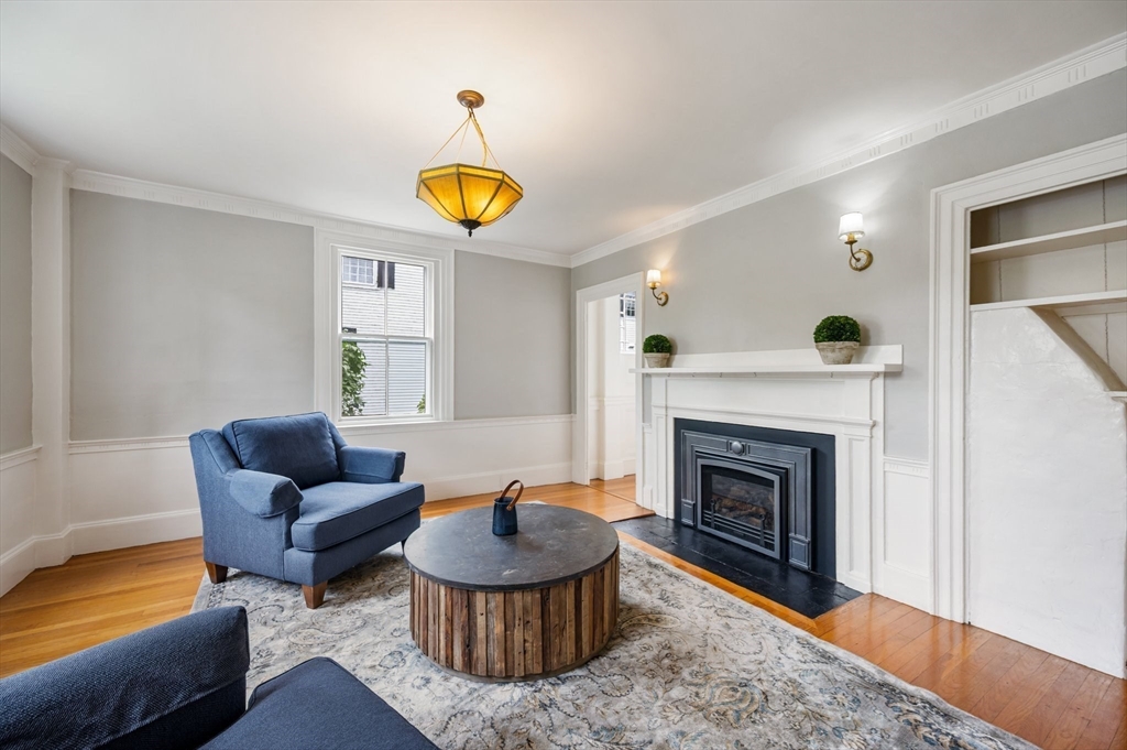 651 Main Street Hingham, MA 02043 - Photo 10 of 42 a living room with furniture and a fireplace