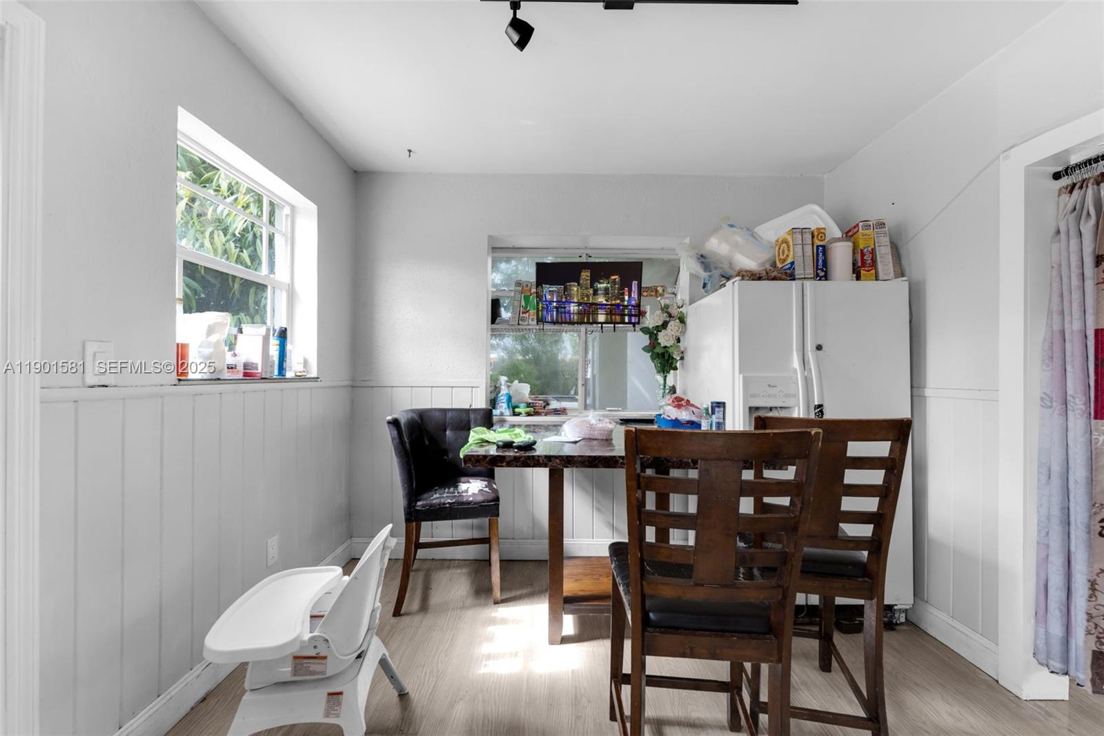 538 Northwest 11th Street Homestead, FL 33030 - Photo 6 of 14 a view of a dining room with furniture and window