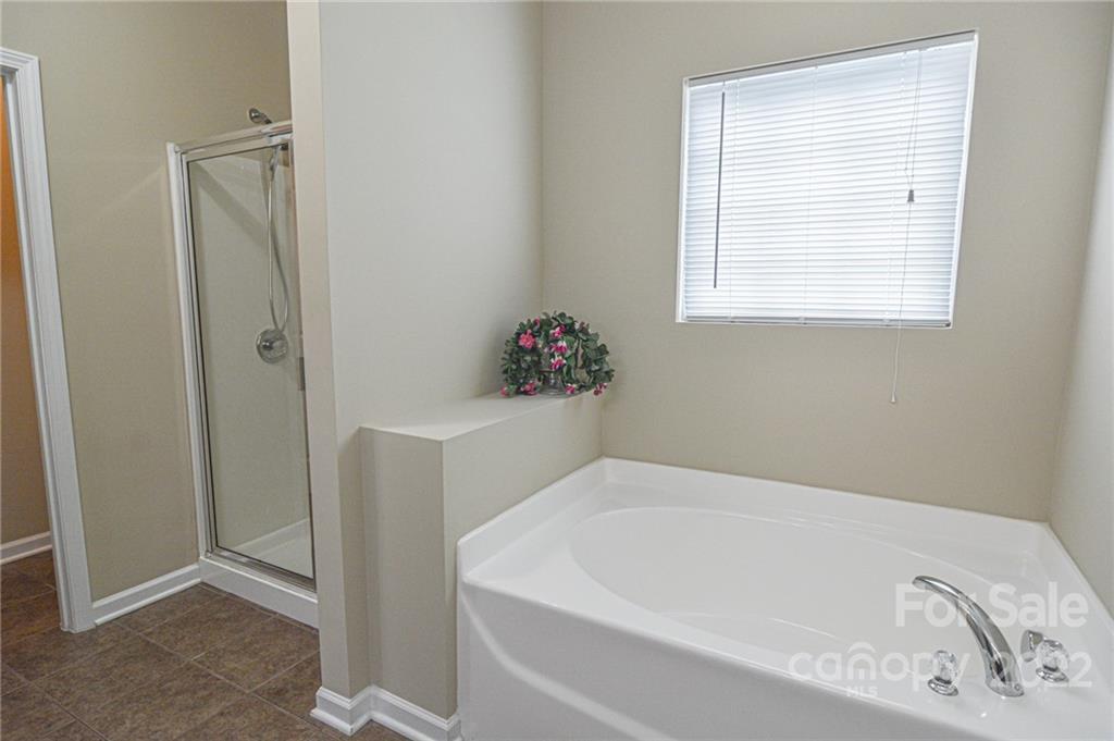 1672 Beleek Ridge Lane Clover, SC 29710 - Photo 15 of 32 a white bath tub sitting next to a window