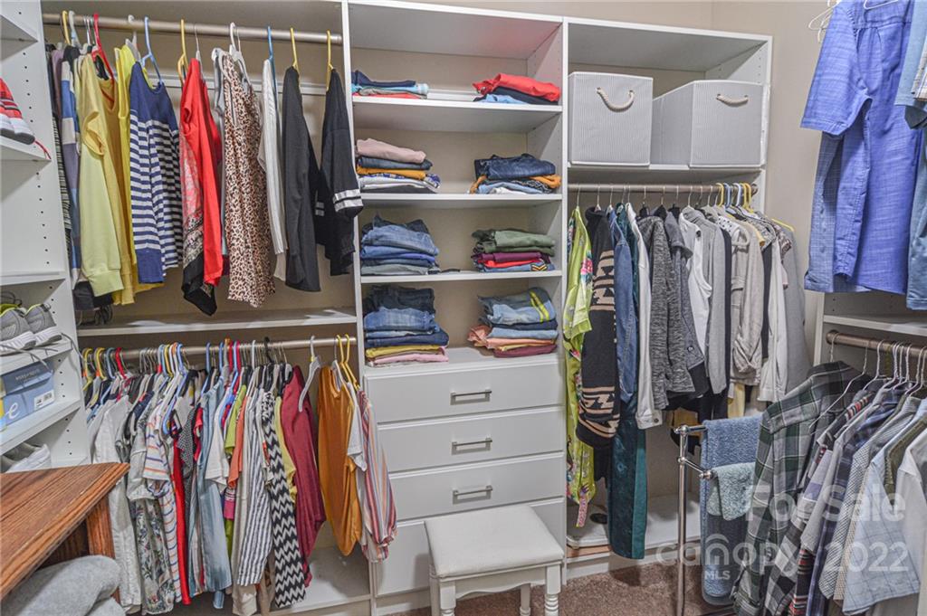 1672 Beleek Ridge Lane Clover, SC 29710 - Photo 27 of 32 a view of walk in closet with clothes