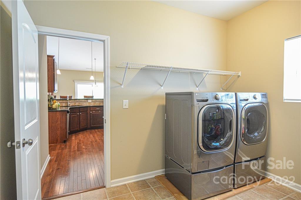 1672 Beleek Ridge Lane Clover, SC 29710 - Photo 28 of 32 a utility room with dryer and washer