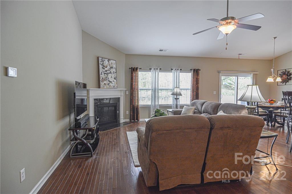1672 Beleek Ridge Lane Clover, SC 29710 - Photo 4 of 32 a living room with furniture a ceiling fan and a window