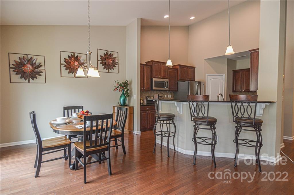 1672 Beleek Ridge Lane Clover, SC 29710 - Photo 7 of 32 a view of a dining room with furniture