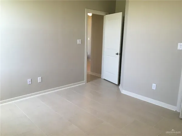 an empty room with an entryway