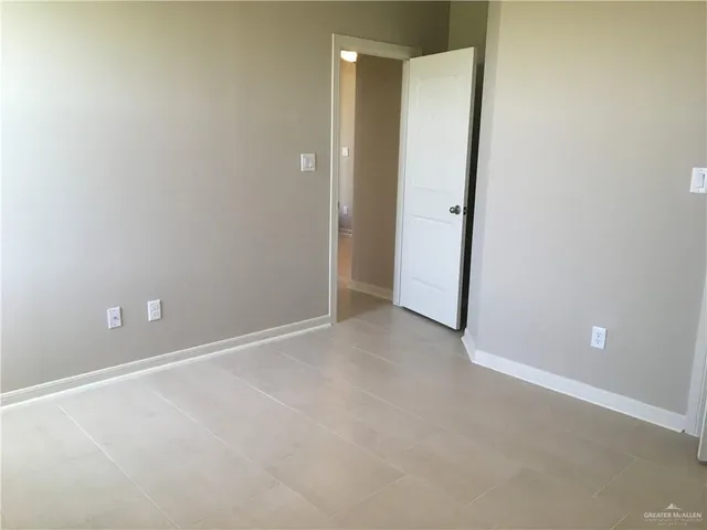 an empty room with an entryway