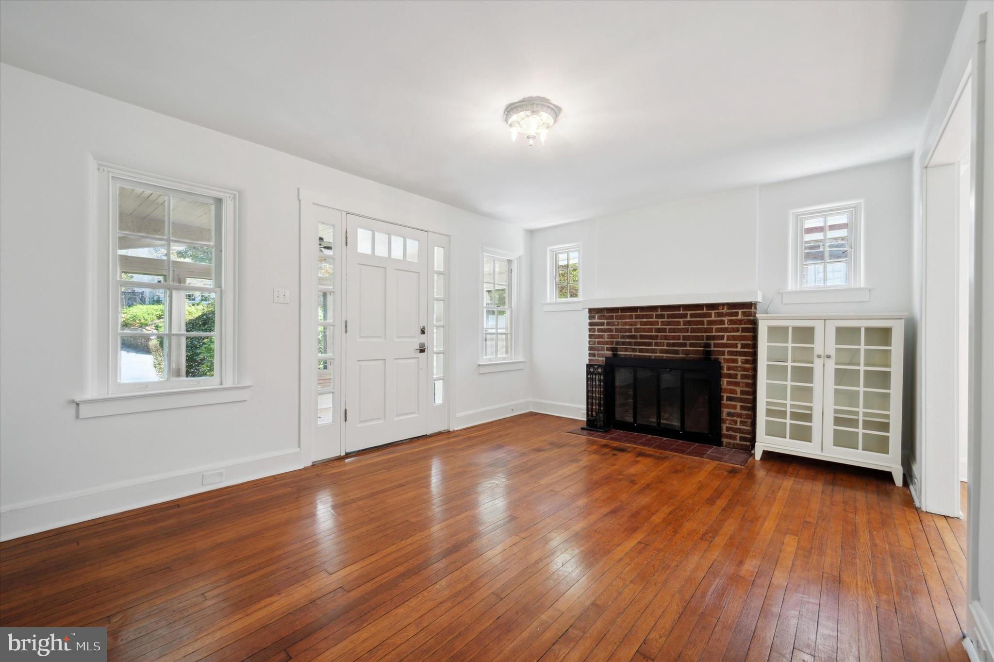 232 Forrest Avenue Narberth, PA 19072 - Photo 6 of 26 Living Room w/ Woodburning Fireplace