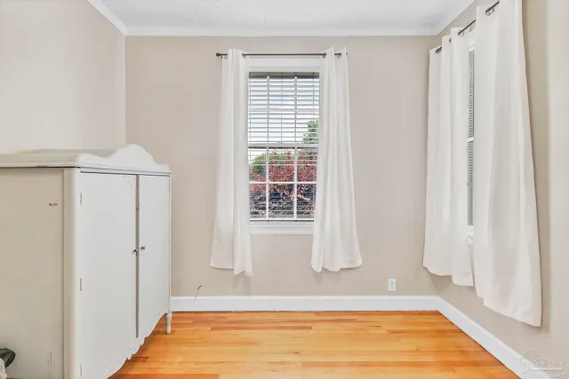 a view of a swimming pool with a chairs