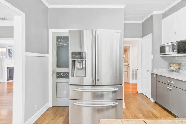 a kitchen with a sink and a window