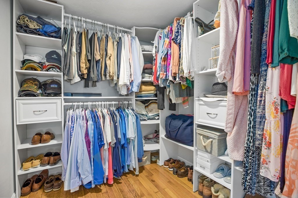 176 Stockbridge Road Scituate, MA 02066 - Photo 14 of 27 a view of walk in closet with clothes and shoes
