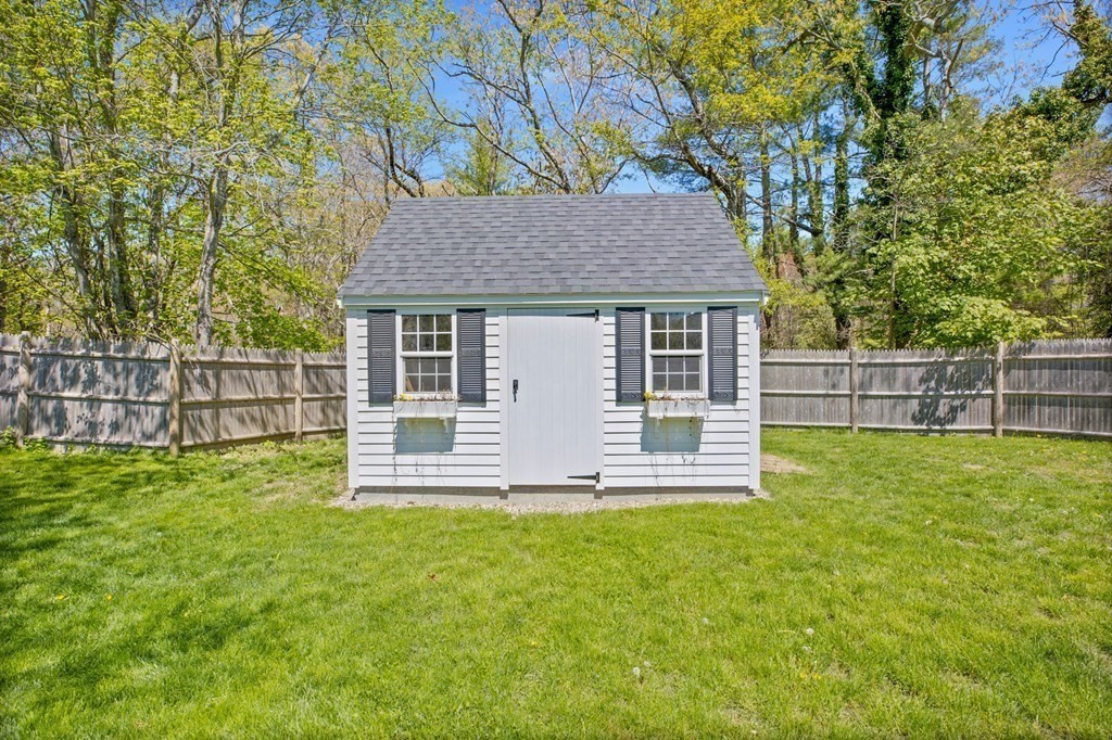 176 Stockbridge Road Scituate, MA 02066 - Photo 23 of 27 a house view with a garden space