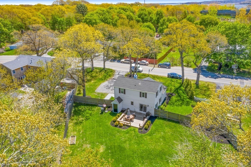 176 Stockbridge Road Scituate, MA 02066 - Photo 25 of 27 an aerial view of a house with a garden and swimming pool