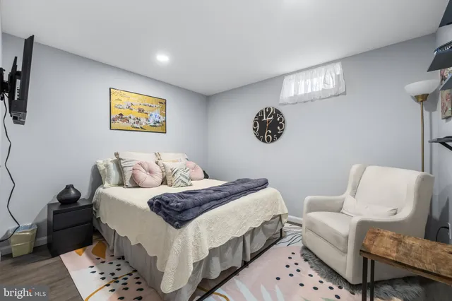 a bedroom with a bed and furniture