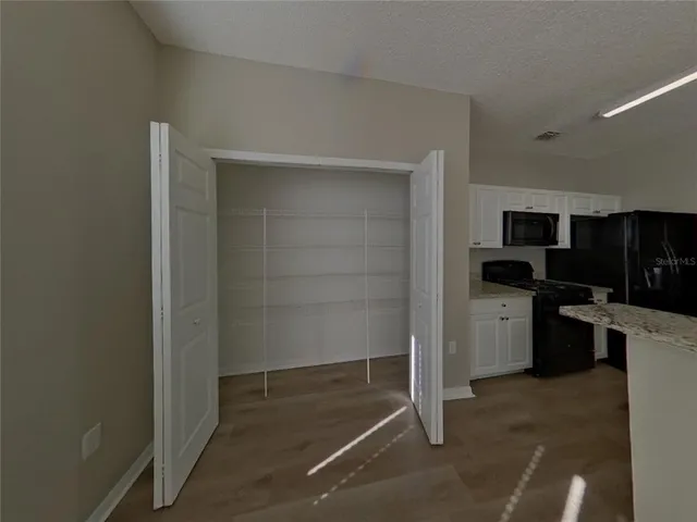 a room with storage and utility