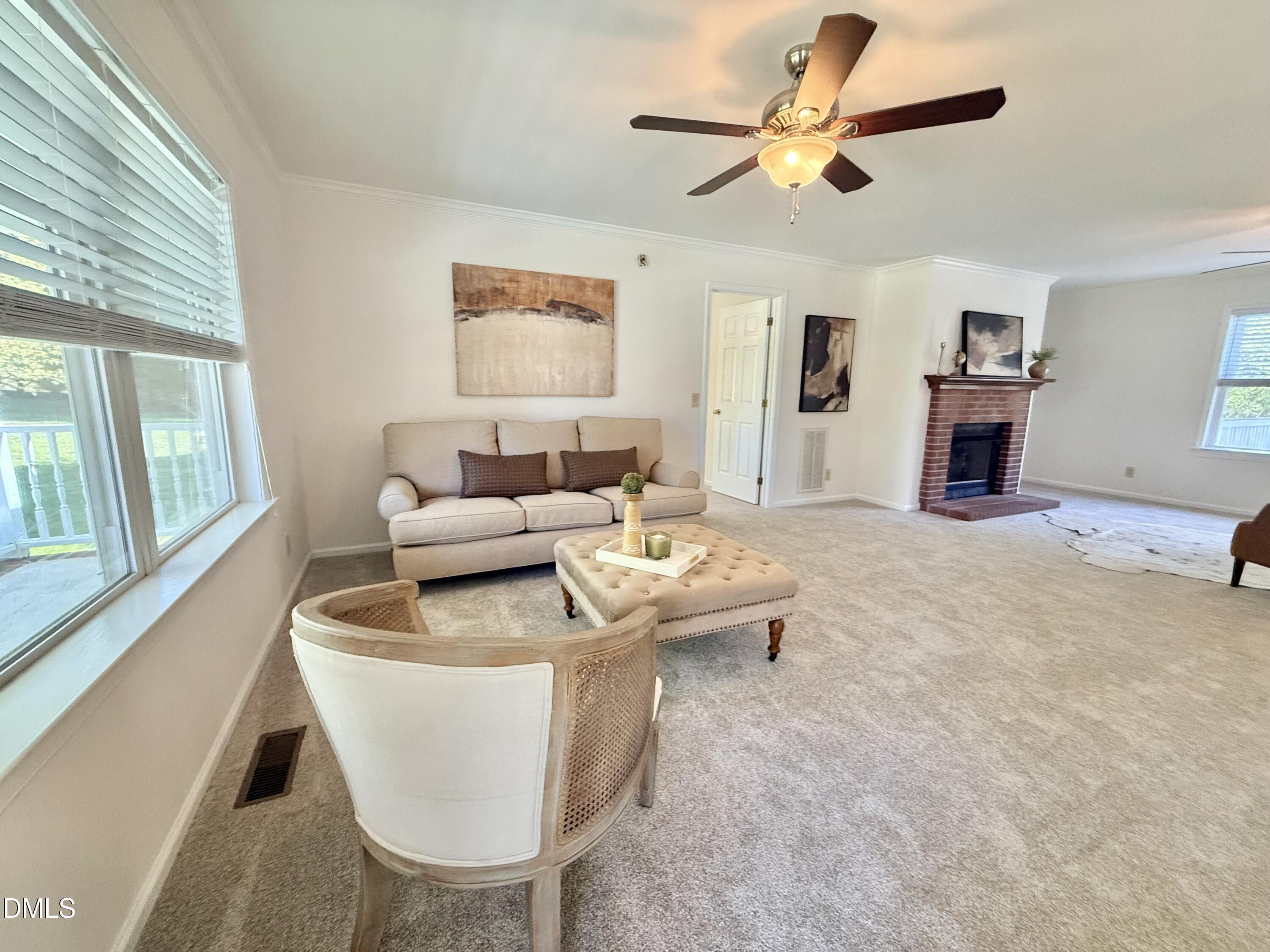 2429 Halifax Road Roxboro, NC 27573 - Photo 9 of 54 a living room with furniture and a large window