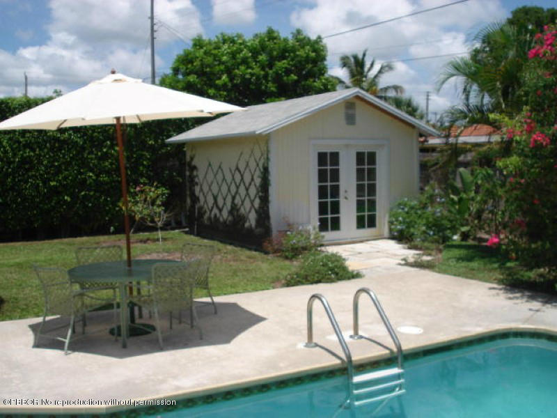 249 Alpine Road West Palm Beach, FL 33405 - Photo 14 of 16 a view of a house with backyard and sitting area