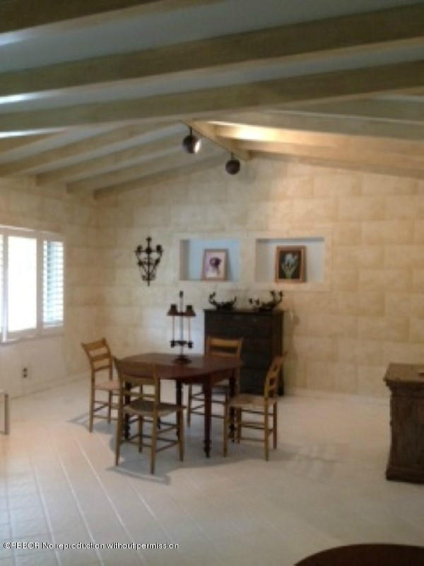 249 Alpine Road West Palm Beach, FL 33405 - Photo 3 of 16 a view of a dining room with furniture