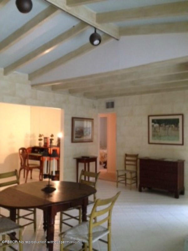 249 Alpine Road West Palm Beach, FL 33405 - Photo 4 of 16 a view of a dining room with furniture
