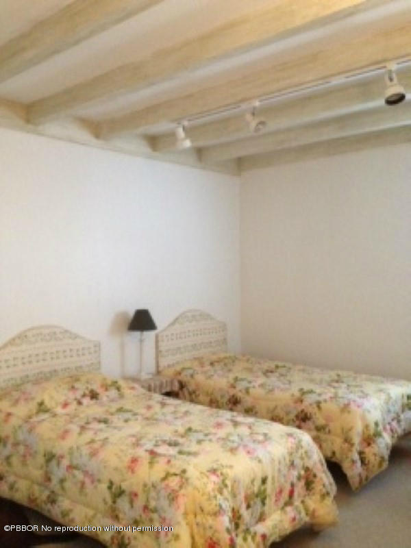 249 Alpine Road West Palm Beach, FL 33405 - Photo 10 of 16 a bedroom with a bed