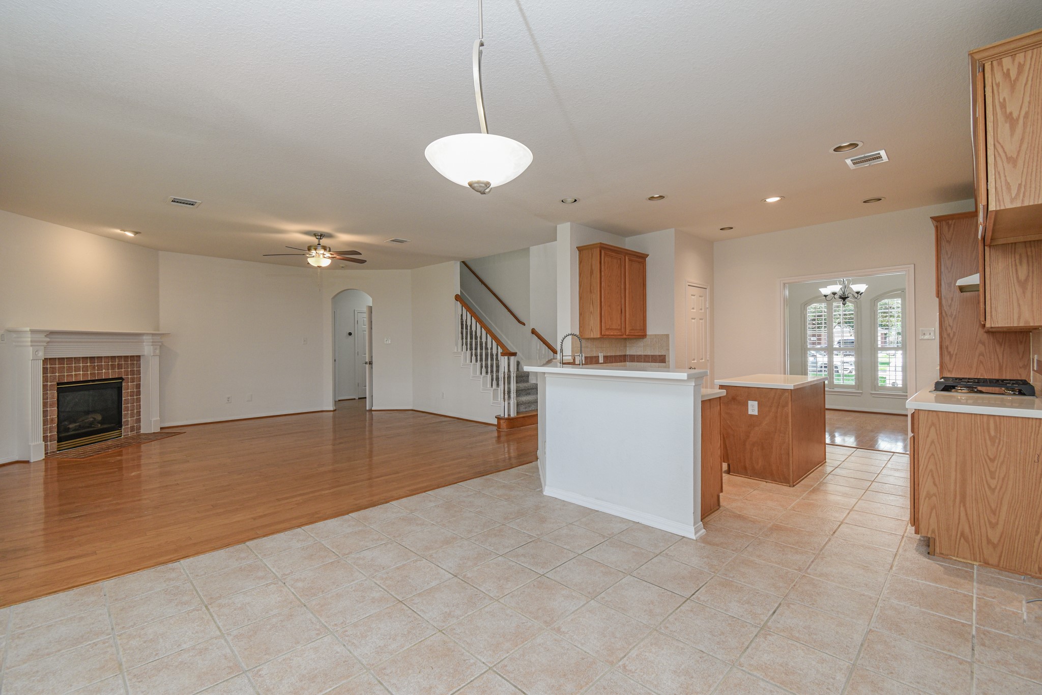 14603 Kings Head Drive Houston, TX 77044 - Photo 11 of 33 a view of a kitchen with a sink and microwave