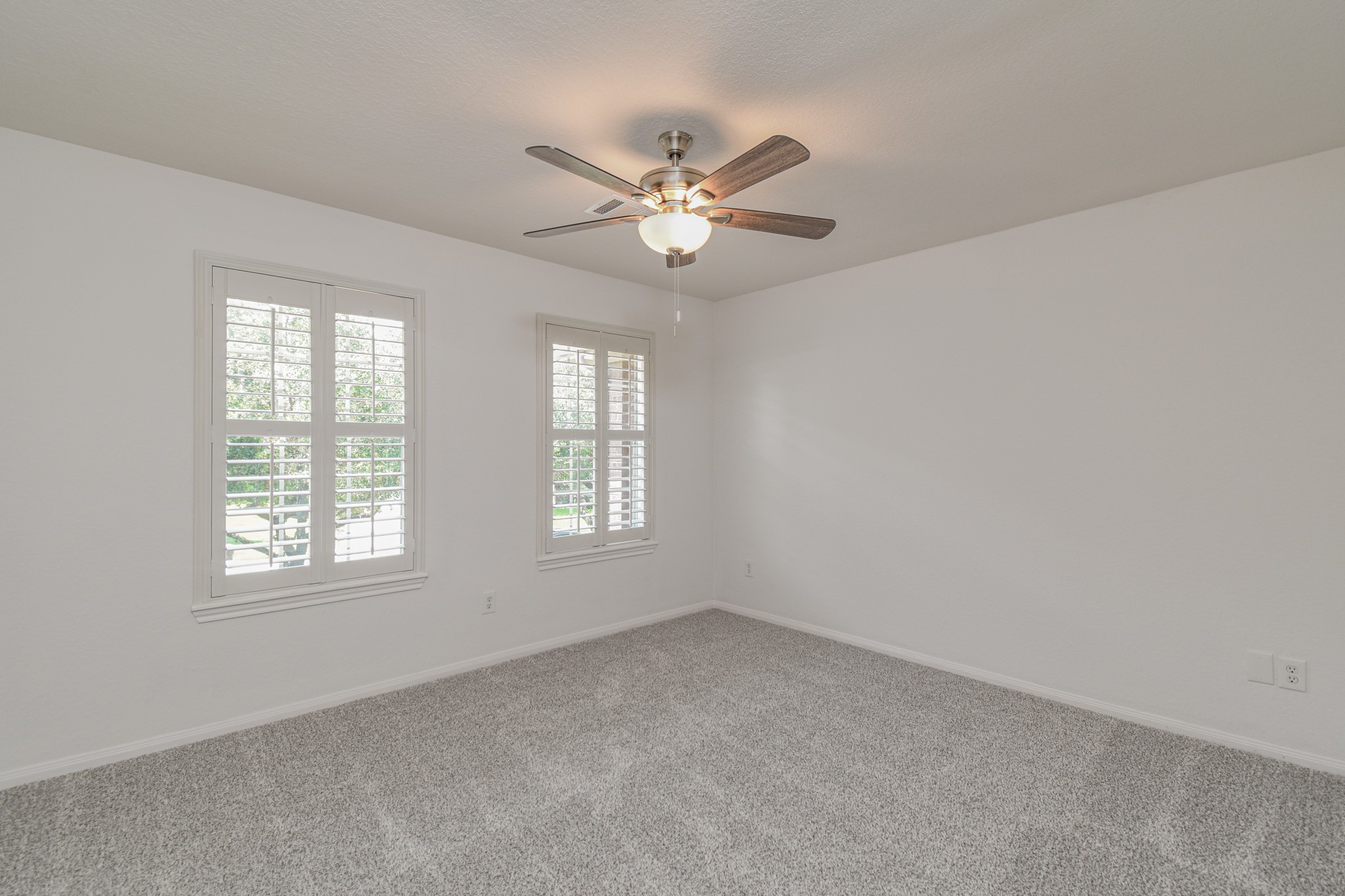 14603 Kings Head Drive Houston, TX 77044 - Photo 23 of 33 a view of an empty room with a window