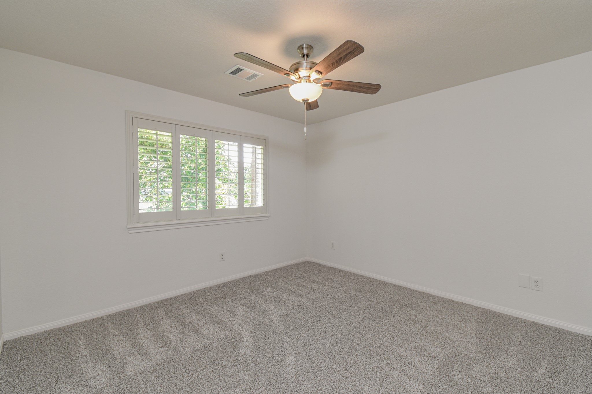 14603 Kings Head Drive Houston, TX 77044 - Photo 27 of 33 an ocean view with a ceiling fan and window