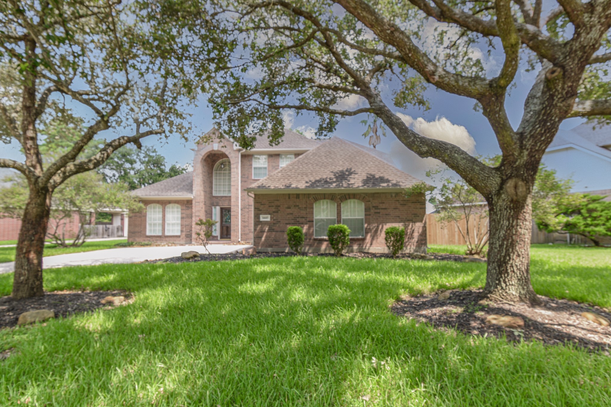 14603 Kings Head Drive Houston, TX 77044 - Photo 3 of 33 a front view of house with yard and green space