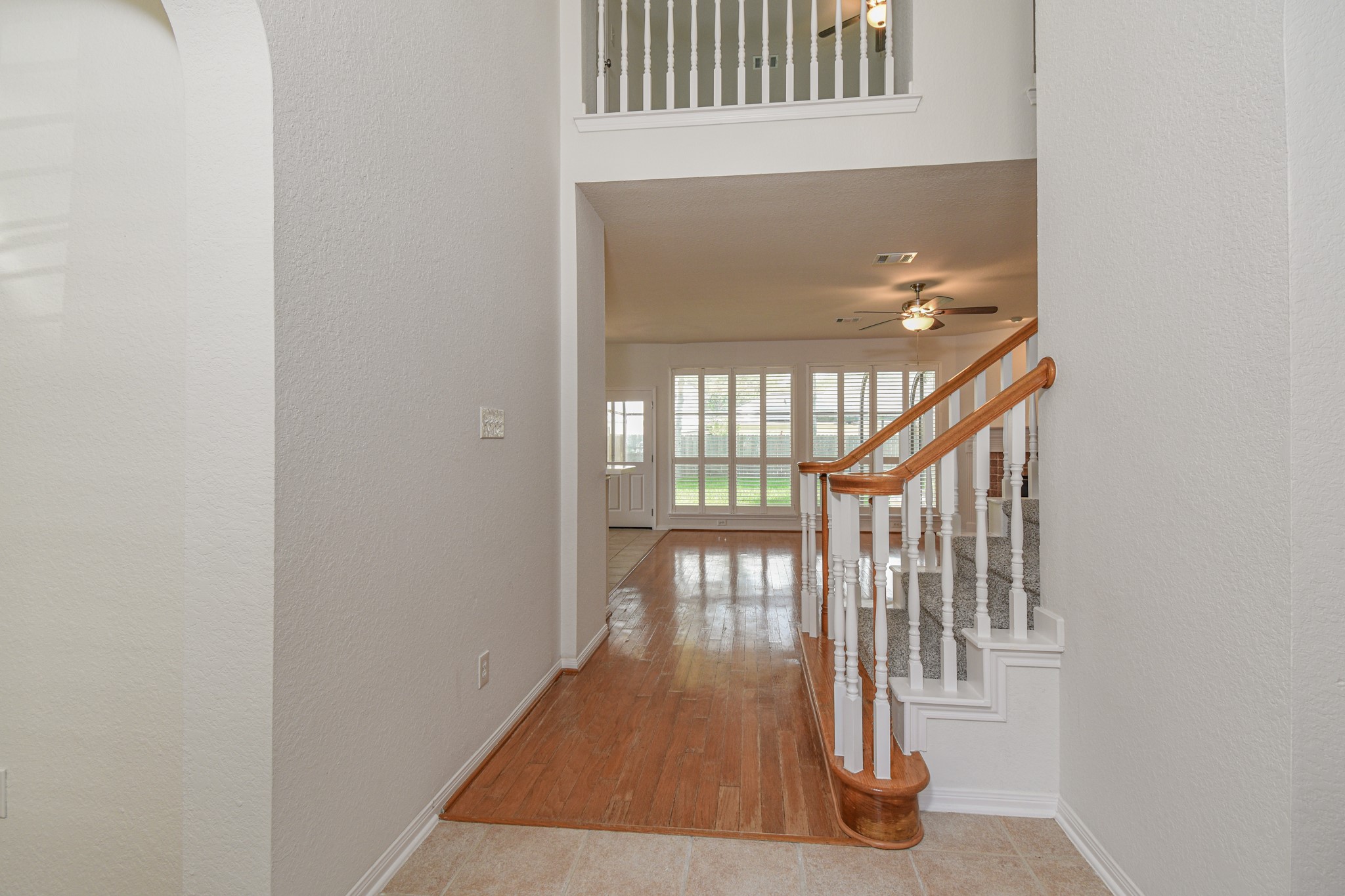 14603 Kings Head Drive Houston, TX 77044 - Photo 4 of 33 a view of staircase with railing and a window