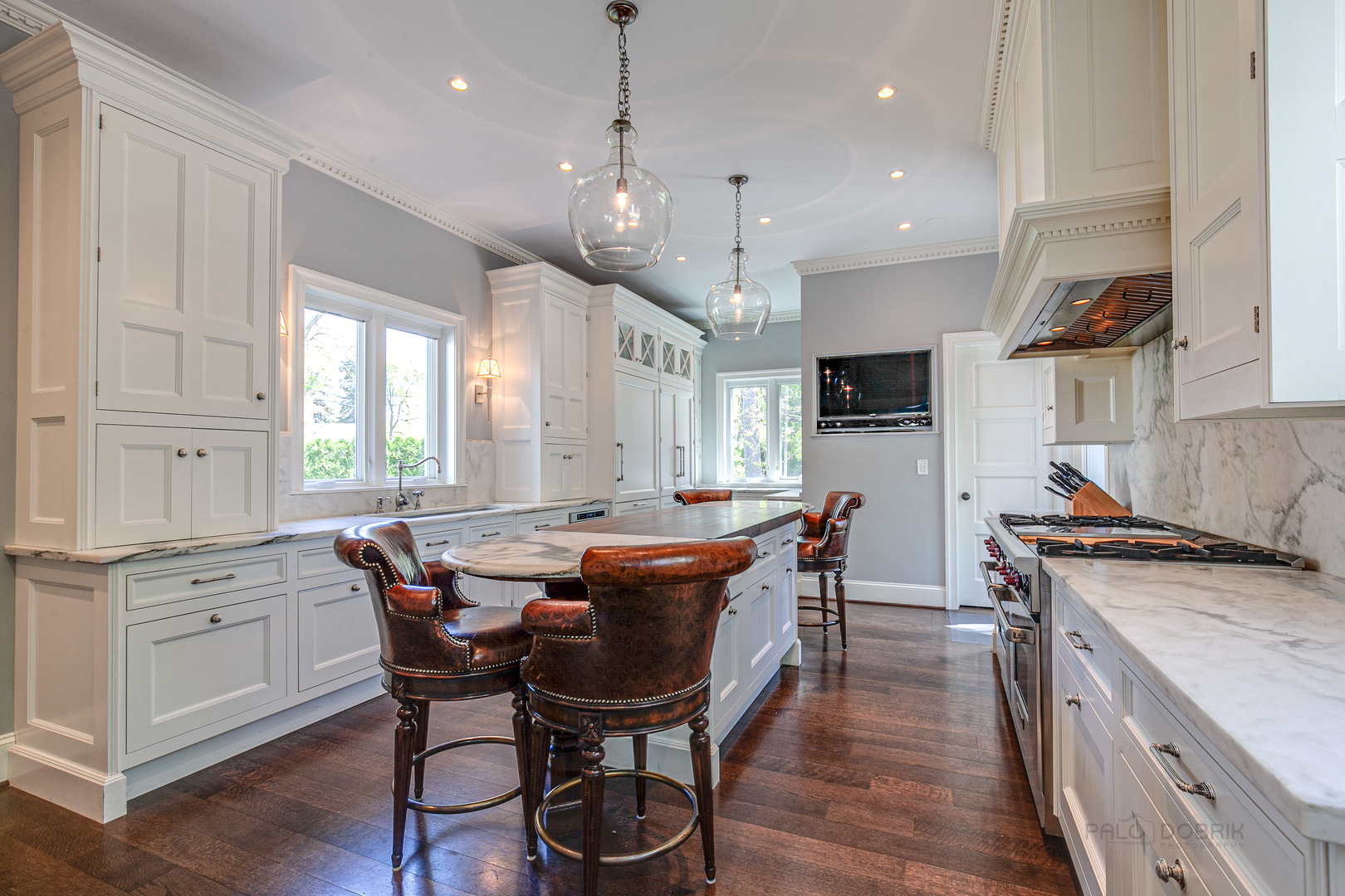 1220 Elm Tree Road Lake Forest, IL 60045 - Photo 14 of 55 a view of a dining room with furniture and wooden floor