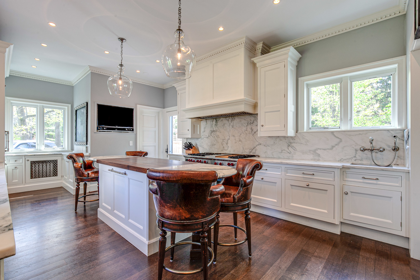 1220 Elm Tree Road Lake Forest, IL 60045 - Photo 15 of 55 a kitchen with a table chairs sink and cabinets