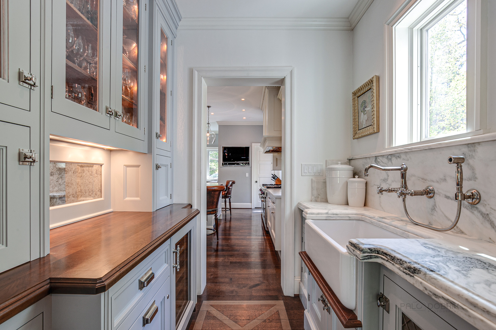 1220 Elm Tree Road Lake Forest, IL 60045 - Photo 17 of 55 a kitchen with a stove a sink and a refrigerator