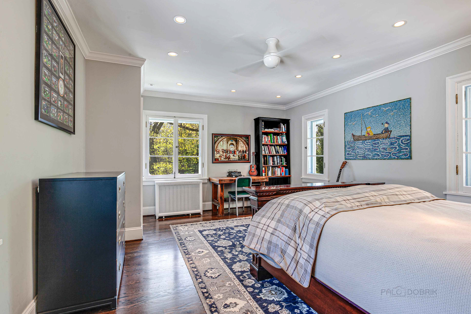 1220 Elm Tree Road Lake Forest, IL 60045 - Photo 31 of 55 a spacious bedroom with a large bed and a window