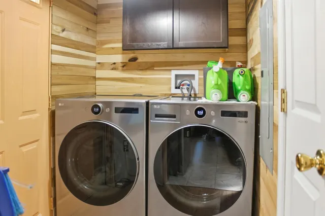 a utility room with dryer and washer