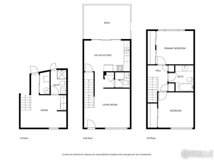 a picture of a bench in front of a building