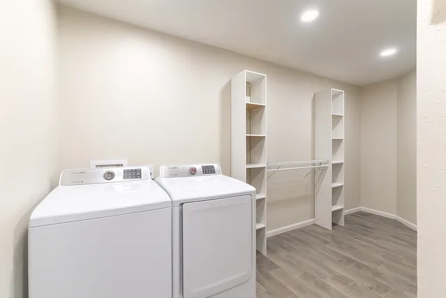 a utility room with dryer and washer
