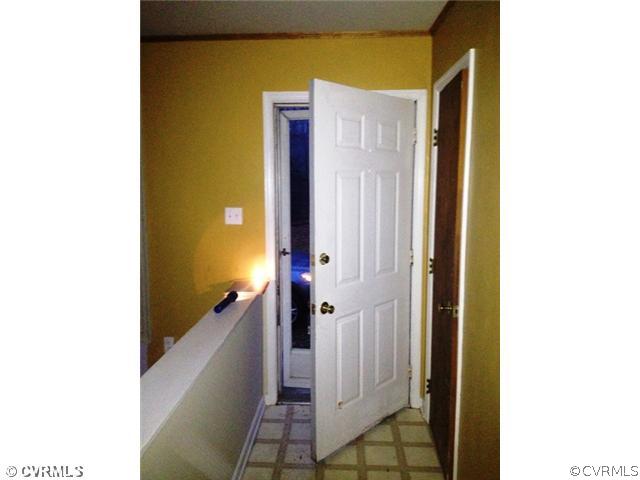 12517 Nash Road Chesterfield, VA 23838 - Photo 2 of 14 a bathroom with a sink and a mirror