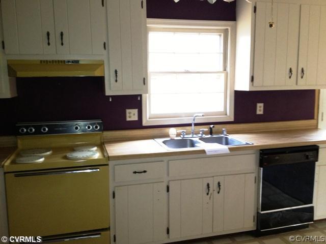 12517 Nash Road Chesterfield, VA 23838 - Photo 7 of 14 a kitchen with a sink cabinets and a window